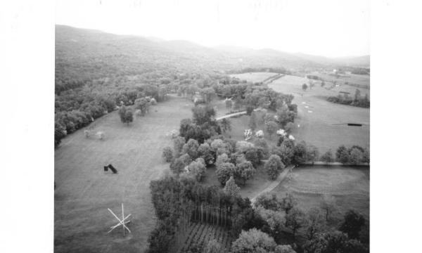 Storm King Art Center looking south: Gilbert Hawkins, <em>Four Poles and Light</em>, 1973; Menashe Kadishman, <em>Suspended</em>, 1977; Robert Grosvenor, <em>Untitled</em>, 1974