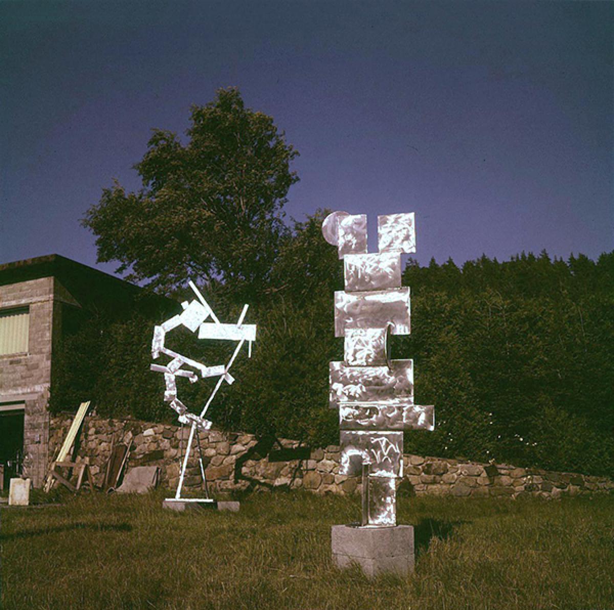 <em>25 Planes </em>(1958) and <em>XI Books III Apples</em> (1959) in the south field at Bolton Landing, NY, 1959