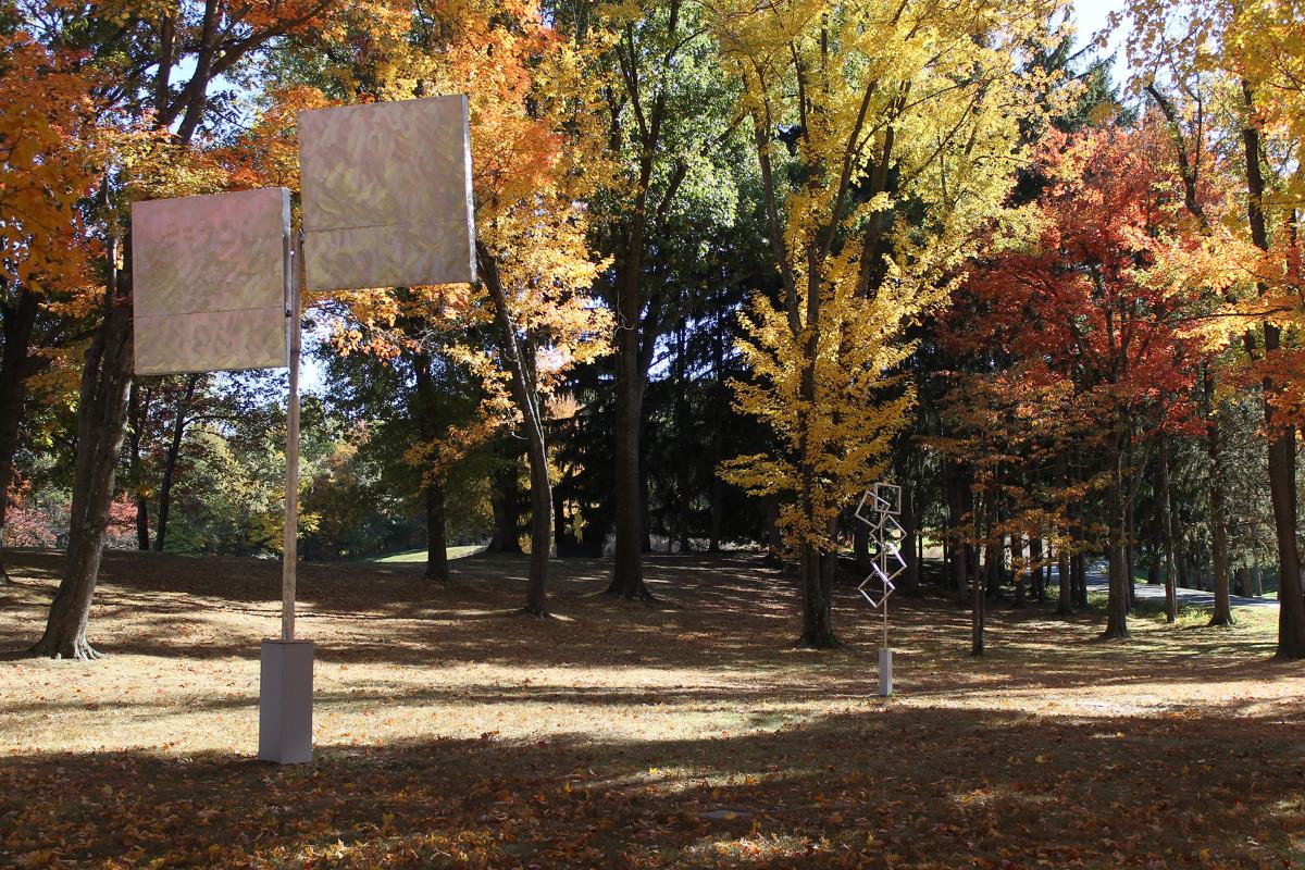George Rickey, <i>Two Planes Vertical-Horizontal II</i>, 1970 and <i>Five Open Squares Gyratory Gyratory</i>, 1981, North Woods, Storm King Art Center (installation view, 2015)