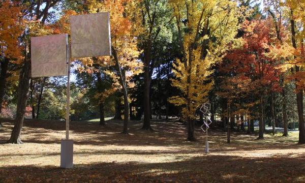 George Rickey, <i>Two Planes Vertical-Horizontal II</i>, 1970 and <i>Five Open Squares Gyratory Gyratory</i>, 1981, North Woods, Storm King Art Center (installation view, 2015)